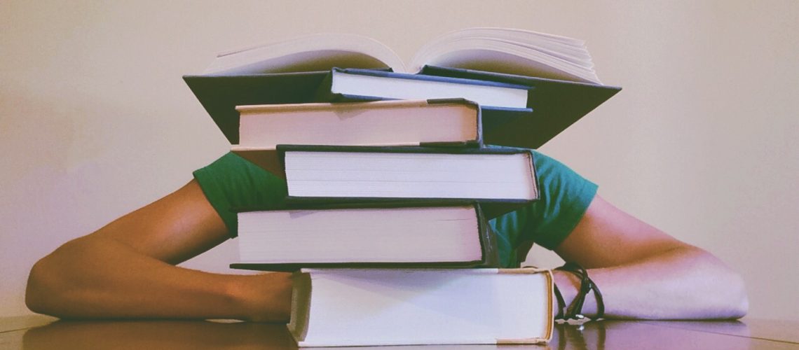 adult-blur-books-close-up-261909
